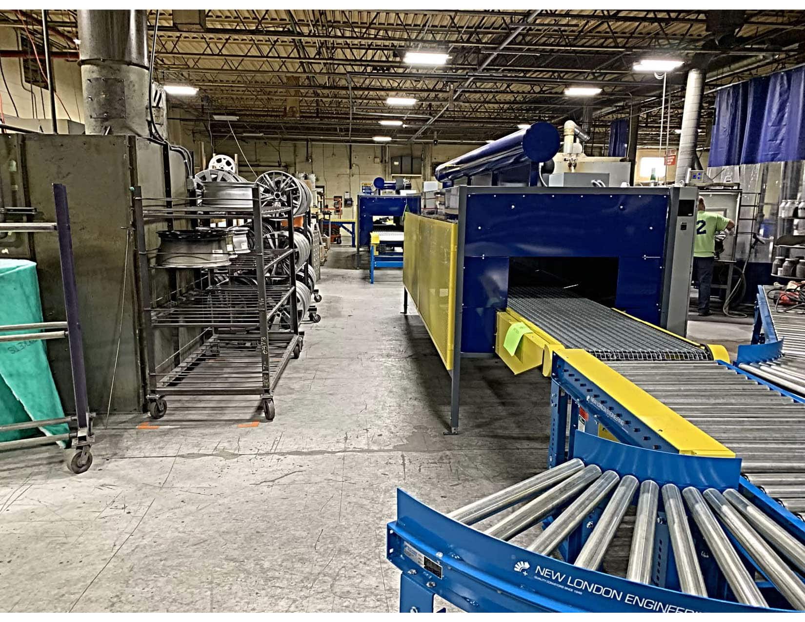 Conveyor oven for wheel finishing